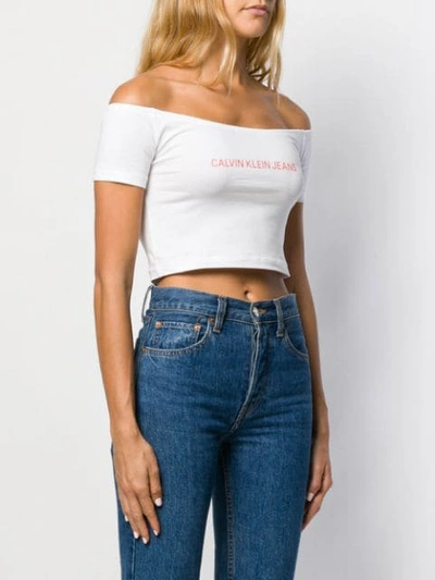 Shop Calvin Klein Jeans Est.1978 Bardot Logo Print Top In White