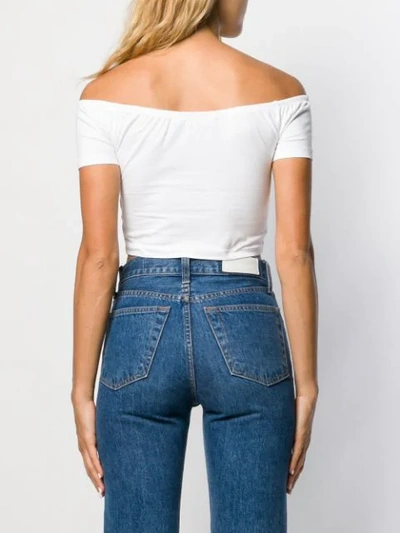 Shop Calvin Klein Jeans Est.1978 Bardot Logo Print Top In White