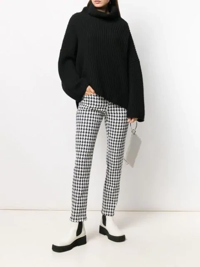 Shop Alexander Mcqueen Houndstooth Print Jeans In Black