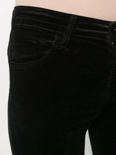 Shop J Brand 815 Velvet Skinny Denim Jeans In Black