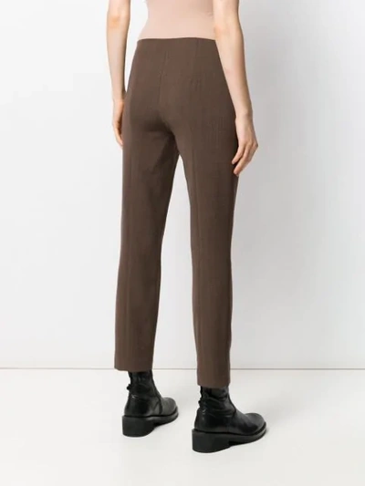 Shop The Row Skinny Fit Trousers In Brown