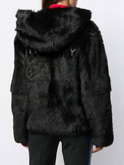Shop Givenchy Oversized Shearling Coat In Black