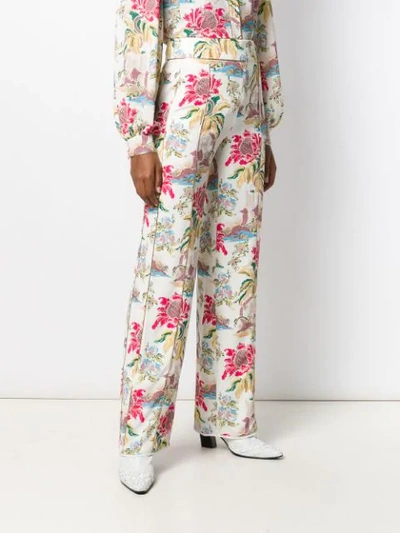 Shop Peter Pilotto Floral Print Trousers In White