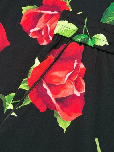 Shop Dolce & Gabbana Wide Leg Rose Print Trousers In Black