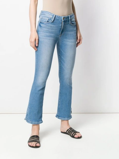 Shop Frame Cropped Flared Jeans In Blue