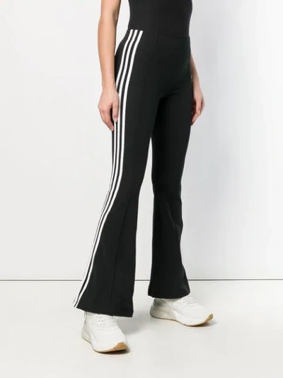 Shop Adidas Originals Flared Track Trousers In Black
