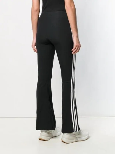 Shop Adidas Originals Flared Track Trousers In Black