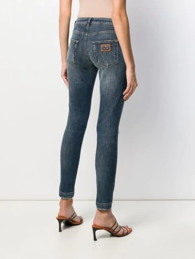 Shop Dolce & Gabbana Distressed Skinny Jeans In Blue