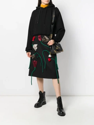 Shop Prada Rose Appliqué Skirt In Black