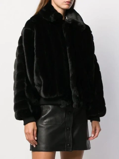 Shop Gcds Oversized Faux Fur Jacket In Black