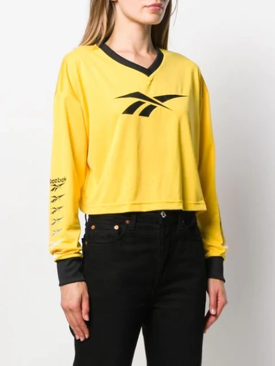 Shop Reebok Cropped Logo Top In Yellow