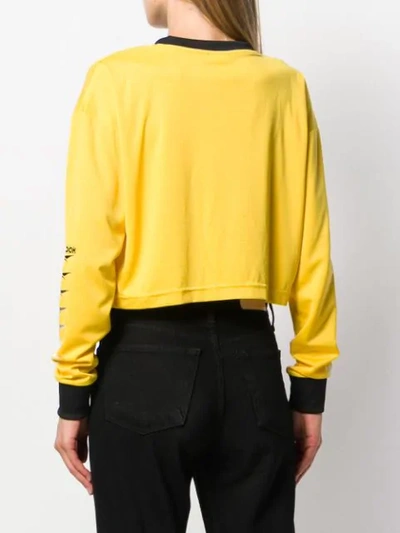 Shop Reebok Cropped Logo Top In Yellow