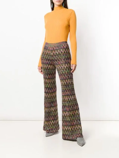 Shop Missoni Flared Knit Trousers - Multicolour