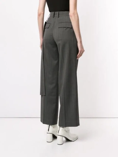 Shop Ader Error Pinstriped Trousers In Grey