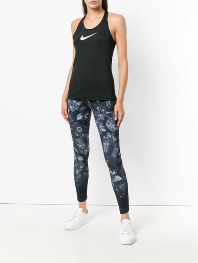 Shop Nike Floral Printed Leggings In Black