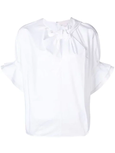 Shop Genny Bluse Mit Rüschen In White