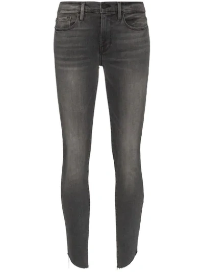 Shop Frame Le Skinny De Jeanne Raw-edge Jeans In Blue