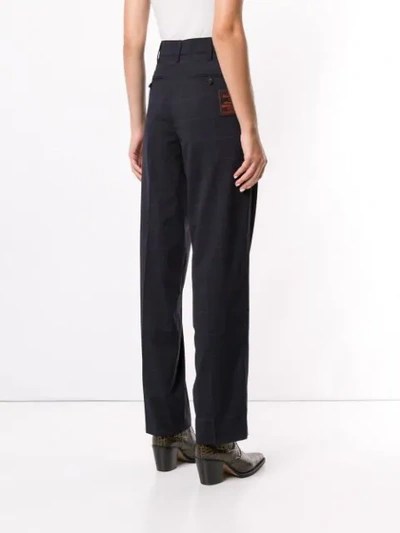 Peter check print trousers