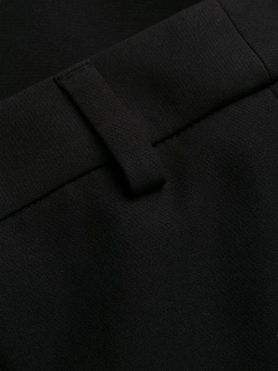 Shop Philipp Plein Long Fringe Trousers In Black