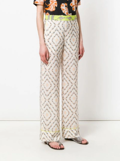 safari printed flared trousers