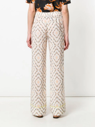 safari printed flared trousers