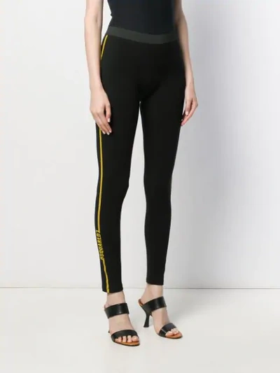 Shop Dsquared2 Printed Logo Leggings In Black