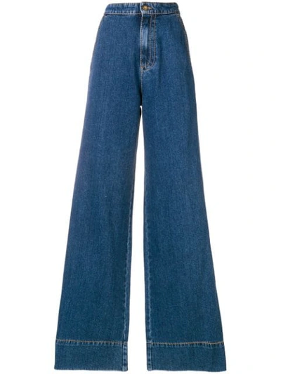 Shop Loewe High Rise Flared Jeans In Blue