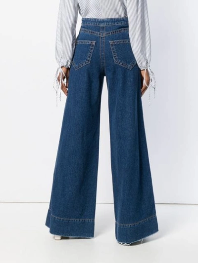 Shop Loewe High Rise Flared Jeans In Blue