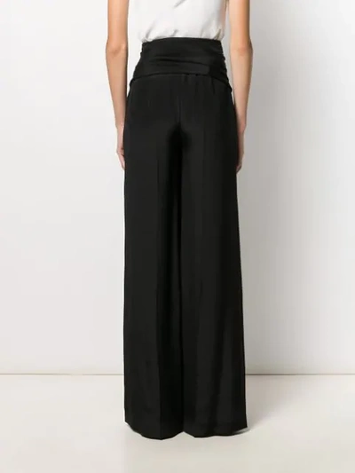 Shop Stella Mccartney Fringed Tie Waist Palazzo Trousers In Black