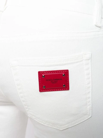 Shop Dolce & Gabbana Cropped Skinny Jeans In White