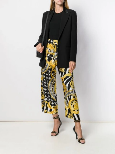 Shop Versace Barocco Printed Wide Leg Trousers In Black ,yellow
