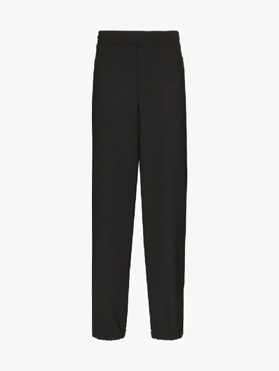 Shop Neil Barrett Side Stripe Wool Trousers In Black