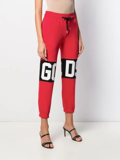 Shop Gcds Logo Print Tracksuit Trousers In Red