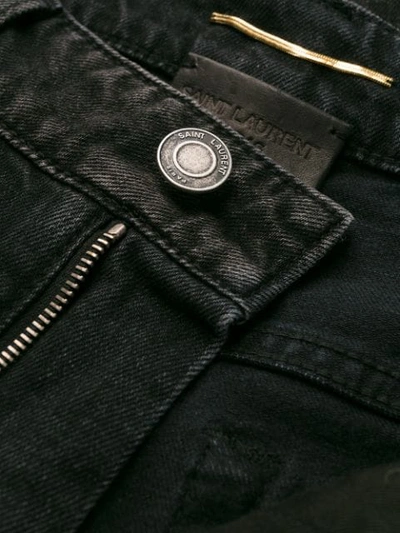 Shop Saint Laurent Stonewashed Skinny Jeans In Black