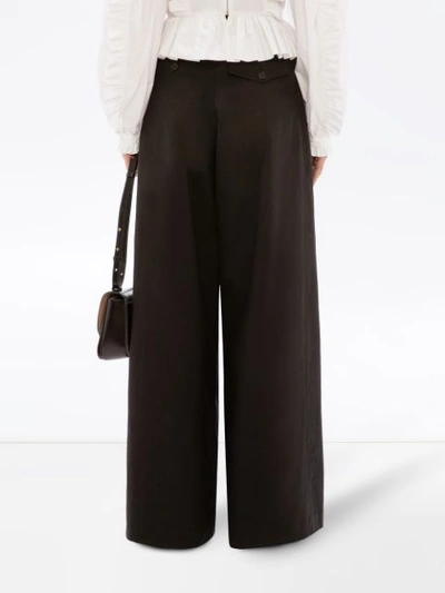 Shop Jw Anderson High-waisted Wide-leg Trousers In Black