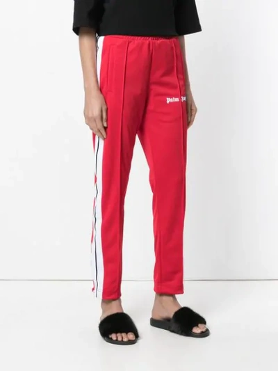 Shop Palm Angels Side-striped Track Pants - Red