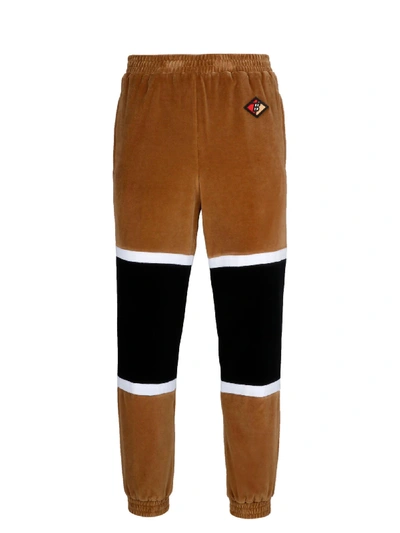 Shop Burberry Brown Cotton Pants