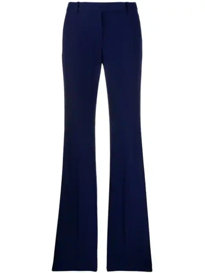 Alexander Mcqueen Longline Flared Virgin Wool-twill Trousers In Blue