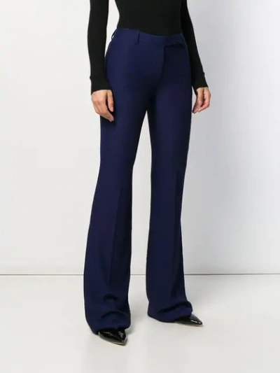 Shop Alexander Mcqueen Flared Tailored Trousers In Blue