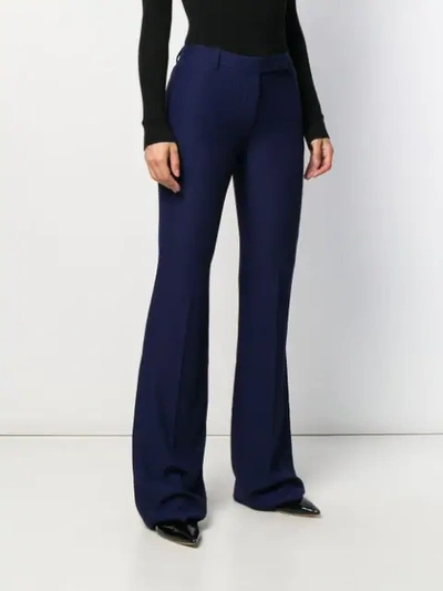 Alexander Mcqueen Longline Flared Virgin Wool-twill Trousers In Blue