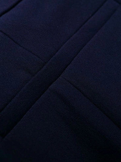 Alexander Mcqueen Longline Flared Virgin Wool-twill Trousers In Blue