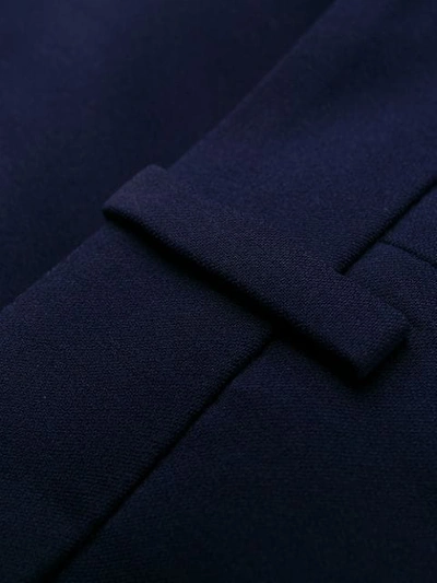 Alexander Mcqueen Longline Flared Virgin Wool-twill Trousers In Blue