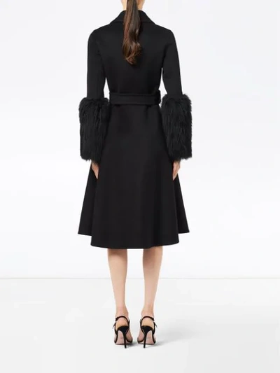 Shop Prada Furry Cuff Coat In Black
