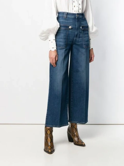 Shop Pinko Flared Cropped Jeans In Blue