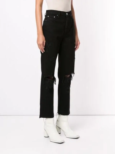 Shop Amiri Thrasher Crop Straight Minimal Jeans In Black