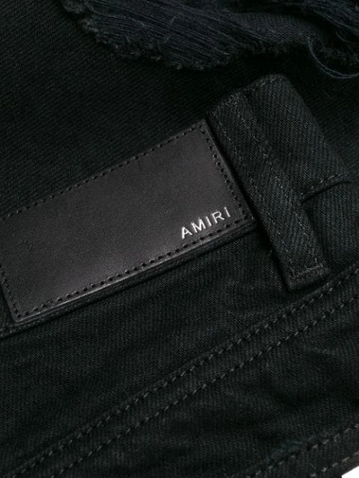 Shop Amiri Thrasher Crop Straight Minimal Jeans In Black