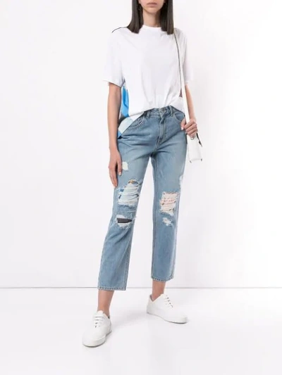 Shop Sjyp Ripped Mom Fit Jeans In Blue