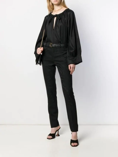 Shop Saint Laurent Slim-fit Trousers In Black