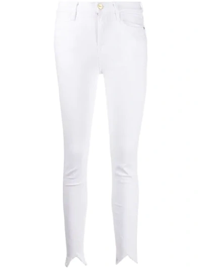 Shop Frame Le High Skinny Jeans In White