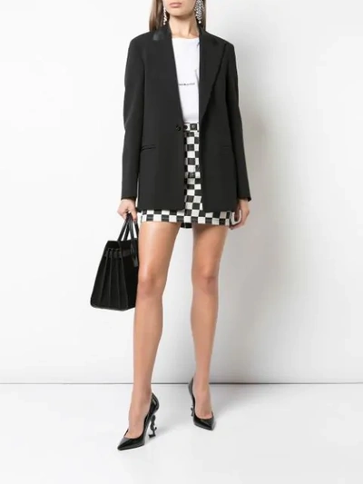 Shop Saint Laurent Checkerboard Mini Skirt In Black